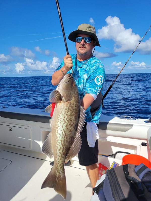 Jeff with a Gag Grouper on a Barefoot Tackle 12oz squid jig